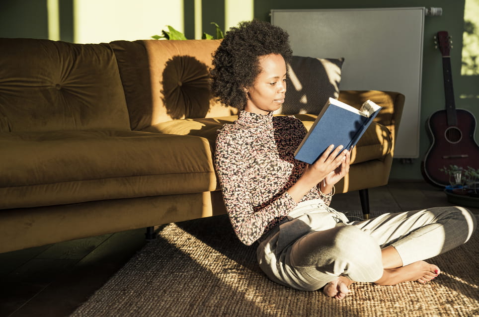 woman-sitting-crosslegged-at-home-best-books-for-career-change