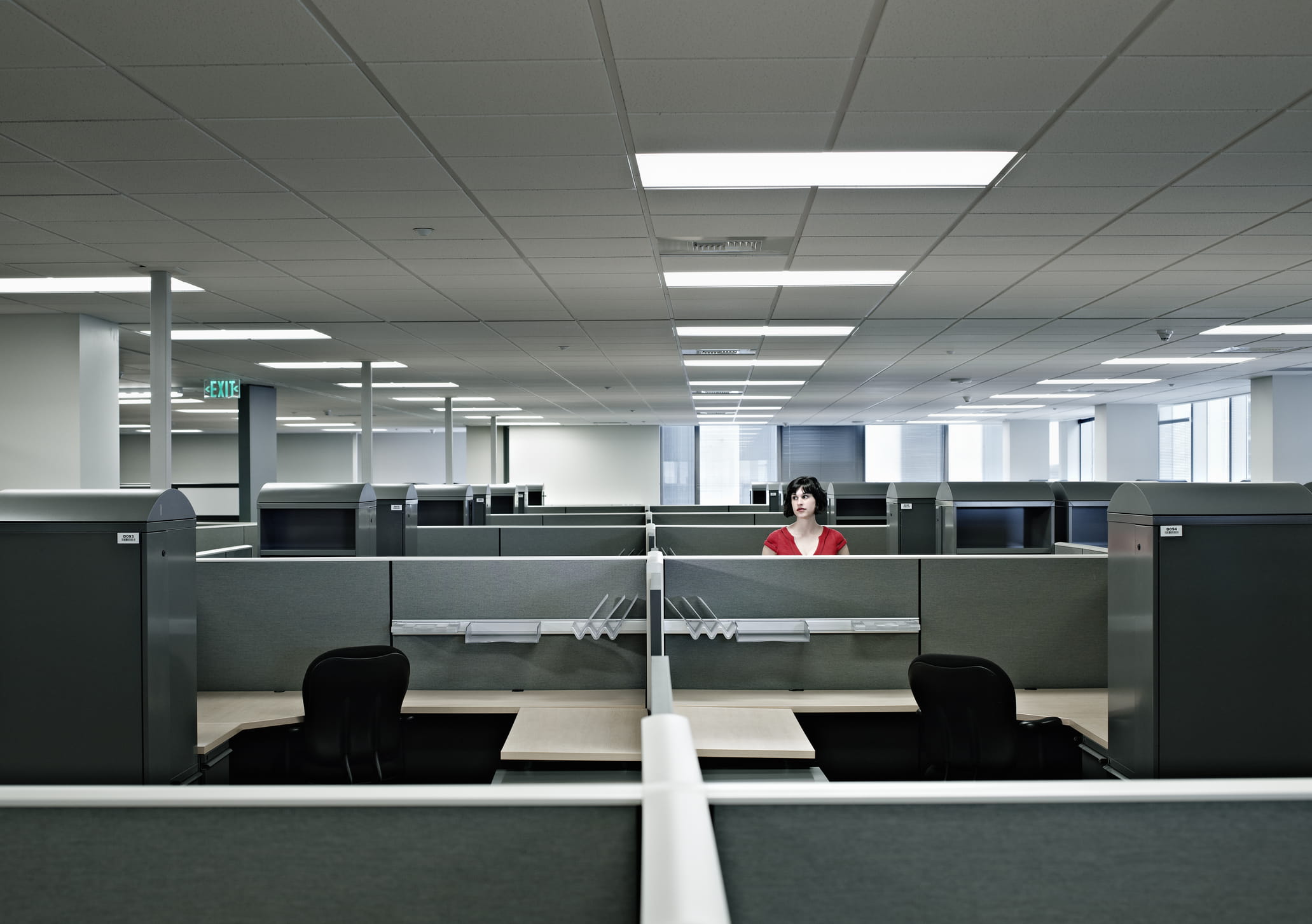 woman-standing-alone-in-office-what-is-shyness