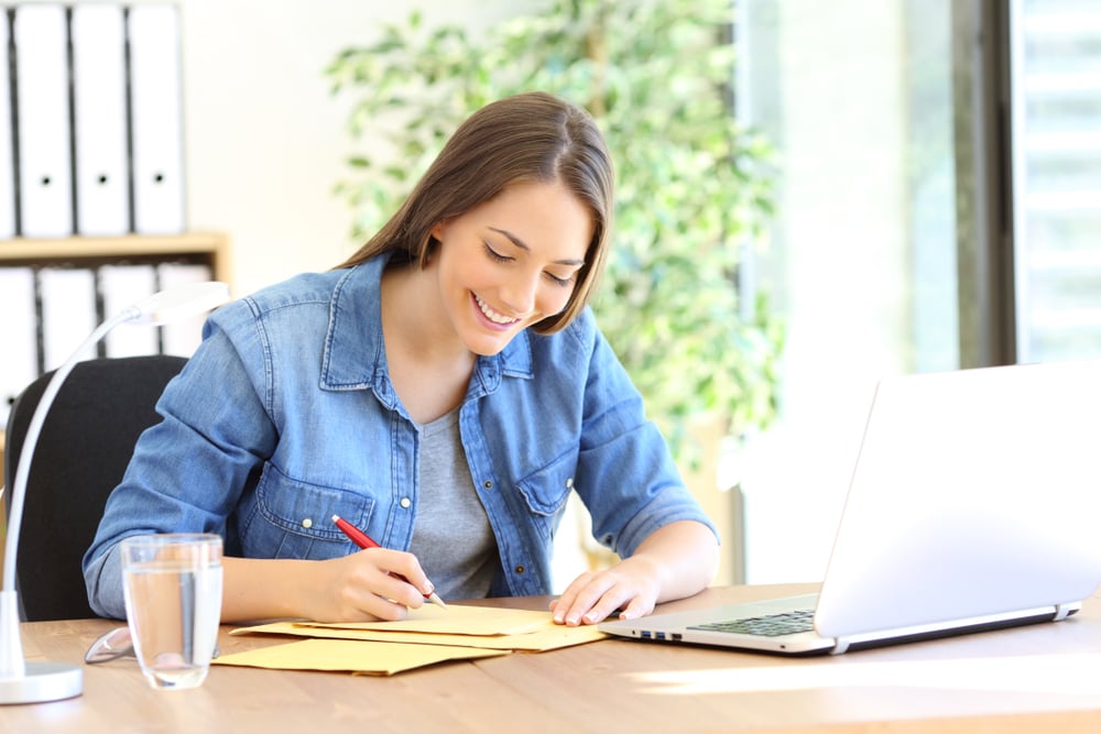 woman-writing-a-letter-farewell-to-a-coworker