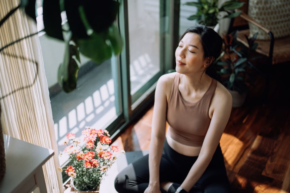 young-woman-meditating-what-is-guided-imagery-for-stress