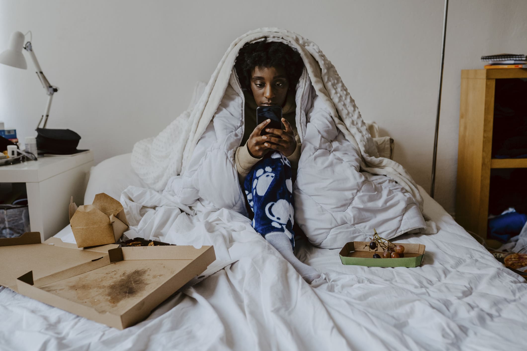 young-woman-sitting-alone-in-bed-what-is-shyness