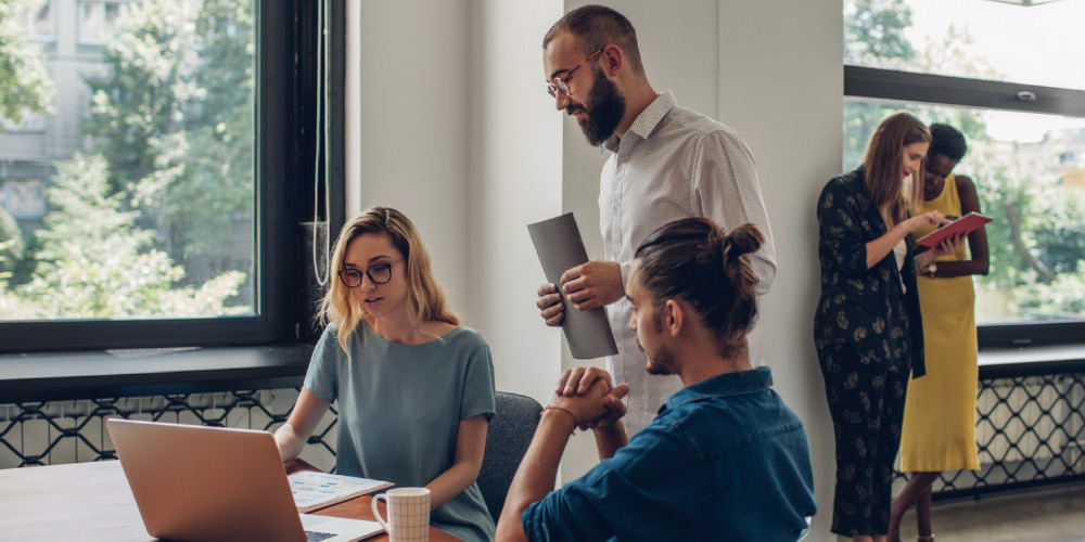 group-working-together-in-office-new-manager-challenges